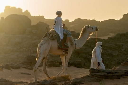 Lucie on the Camel with guide